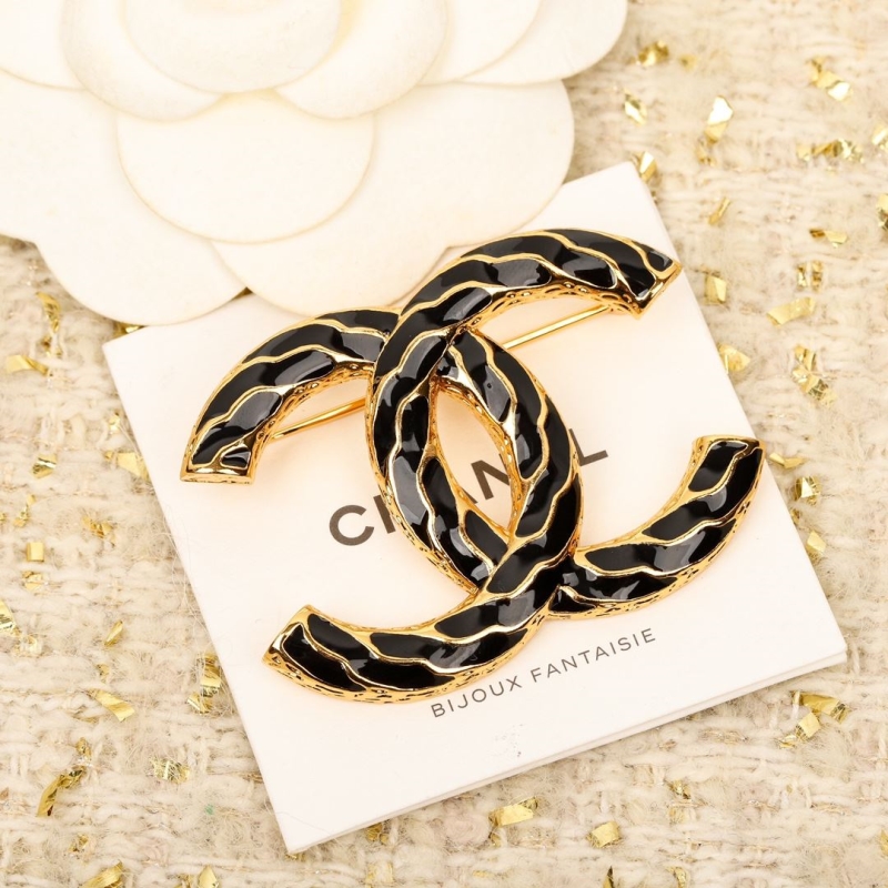 Ch**el brooches